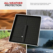 All-weather black rubber vehicle floor mat designed to resist sand, snow, mud, and rain.