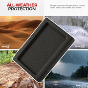 Black all-weather vehicle floor mat protecting against sand, snow, mud, and rain.