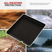 Black all-weather rubber cargo tray for 4x4 vehicle protection against sand, snow, mud, and rain.