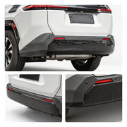Rear view of a white SUV featuring a black durable rear bumper protector and skid plate.