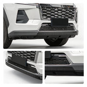 Front view of a white SUV featuring a black honeycomb grille and heavy-duty bumper protection.