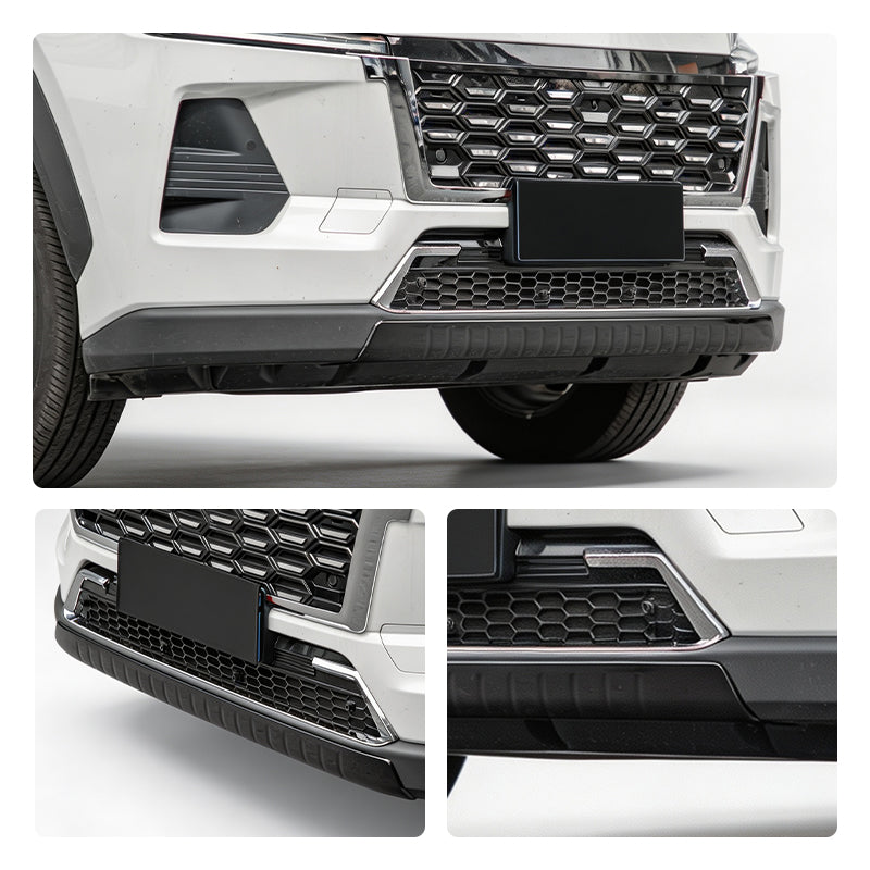 Front view of a white SUV featuring a black honeycomb grille and heavy-duty bumper protection.