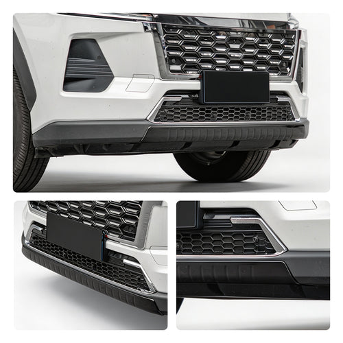 Front view of a white SUV featuring a black honeycomb grille and heavy-duty bumper protection.