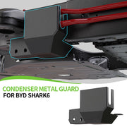Black metal condenser guard installed on a BYD Shark 6 vehicle chassis.