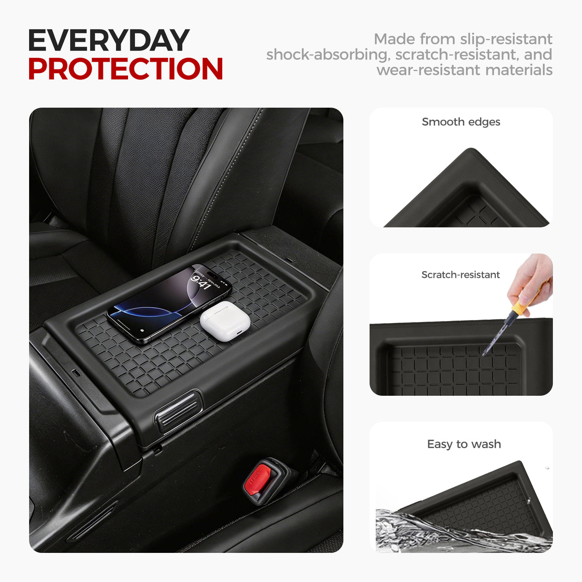 Black rubber center console organizer tray with a smartphone and wireless earbud case.