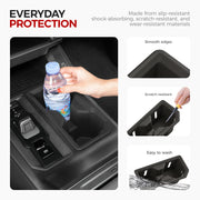 Black durable center console tray with smooth edges and scratch-resistant material.