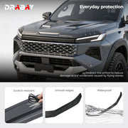 Grey 4x4 vehicle with front hood protector and windshield airflow redirection accessory.
