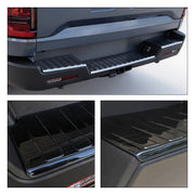 Black textured protective step pad for 4x4 vehicle rear bumper and tailgate.