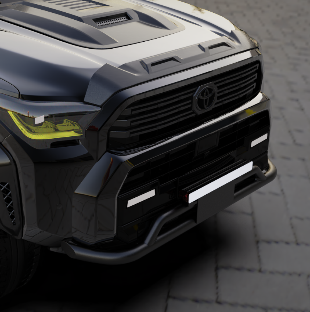 Close-up of a black Toyota 4x4 with a customized front grille and bumper protection.