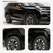 Black SUV with orange side stripe decal and silver alloy wheels