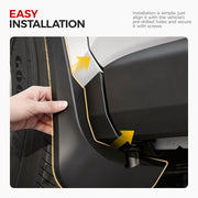Hand installing a black durable 4x4 vehicle mud flap onto a car wheel well using pre-drilled holes.