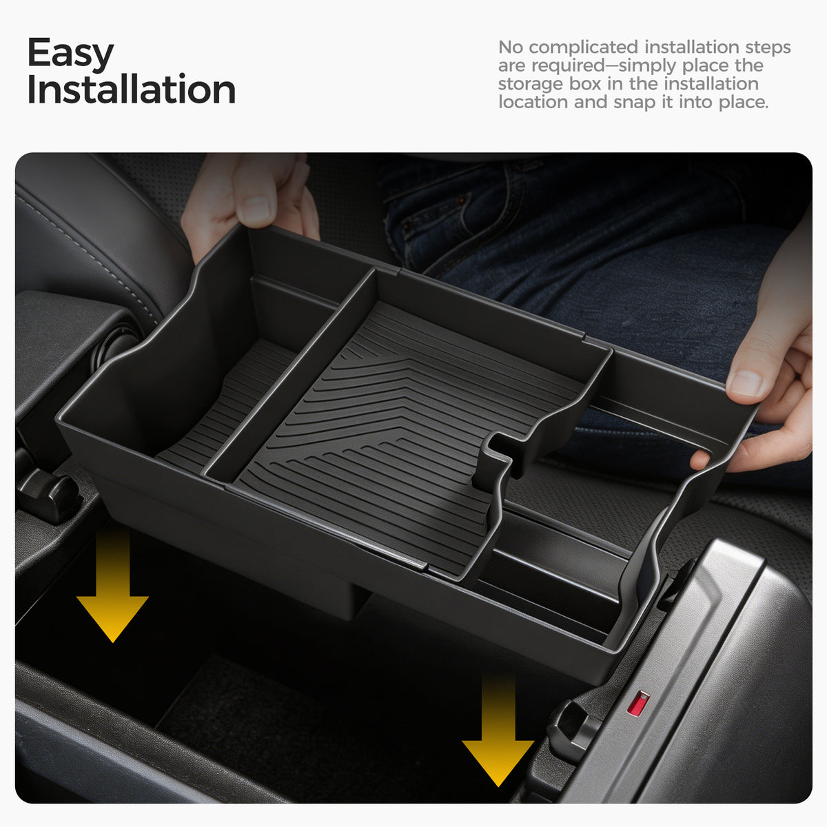 Hands installing a black plastic car center console storage organizer tray.