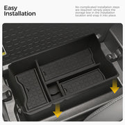 Easy installation of a black modular vehicle storage organizer in a car console.