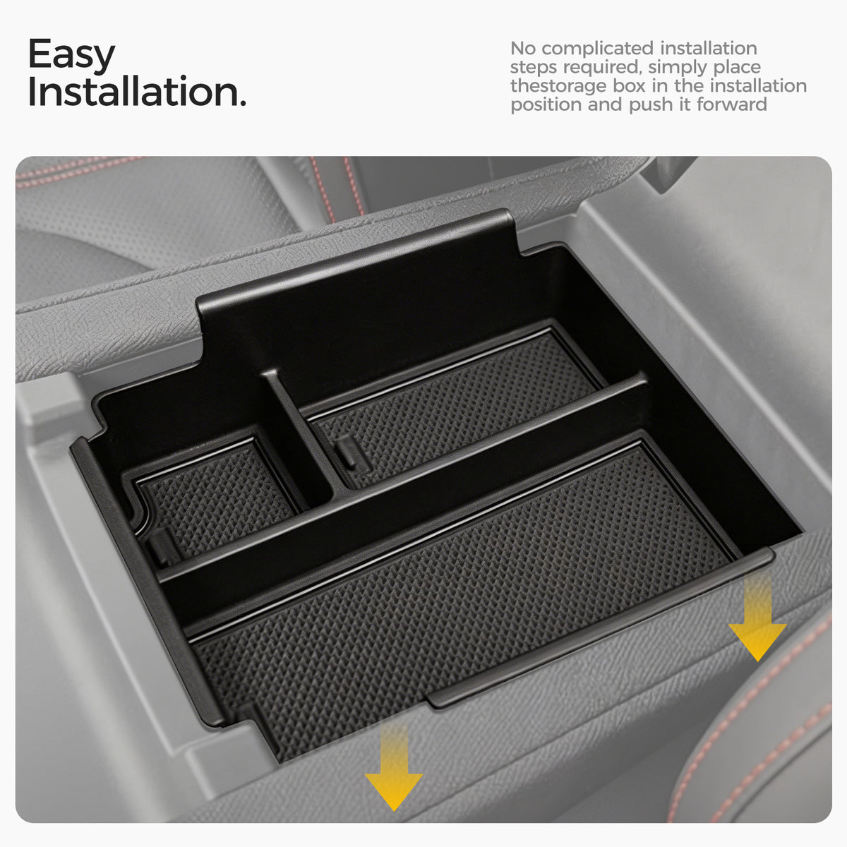 Black center console organizer tray for vehicle interior with rubberized liners.