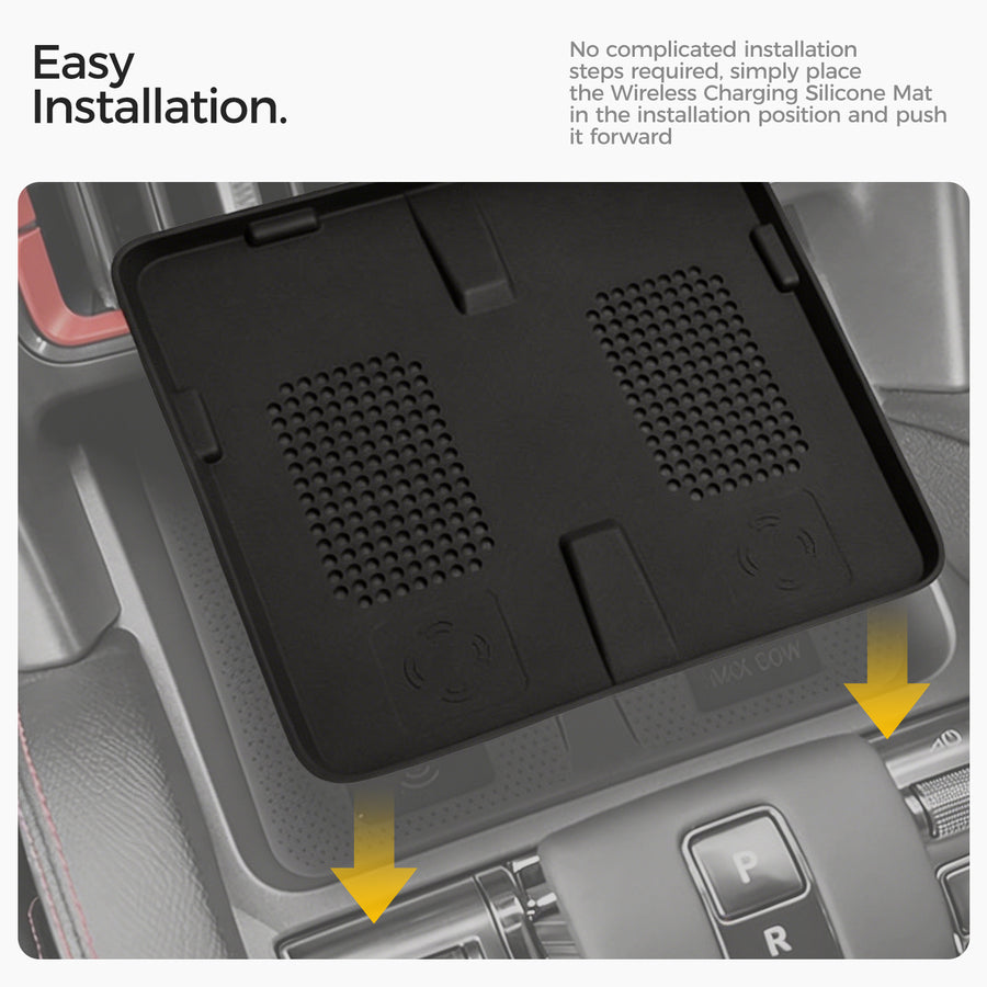 Wireless charging silicone mat being installed in a vehicle center console.