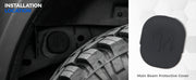 Installation guide for a main beam protective cover on a 4x4 vehicle wheel arch.
