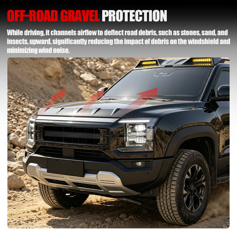 Black off-road truck with a hood deflector reducing debris impact on the windshield.