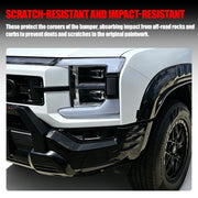 Black scratch-resistant bumper corner protector installed on a white 4x4 vehicle.