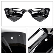 Glossy black 4x4 vehicle trim accessories and protective body panels.