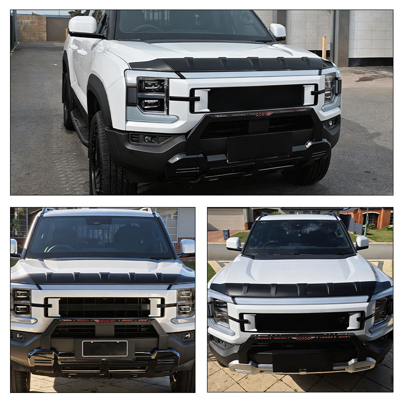 Front view of a white 4x4 truck featuring a black hood protector and grill guard.