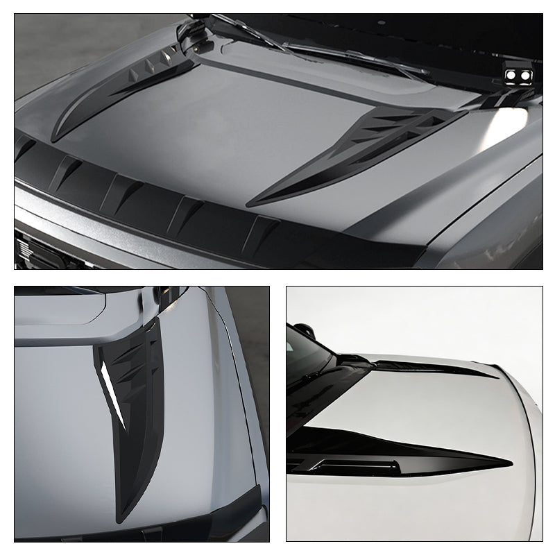 Black aerodynamic hood vents and air scoops for 4x4 vehicle performance and styling.