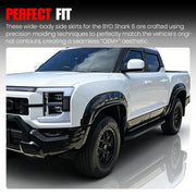 Black wide-body side skirts and fender flares installed on a white BYD Shark 6 pickup truck.