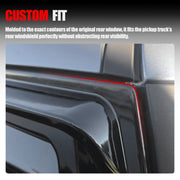 Custom fit molded rear window deflector for pickup truck windshield protection.