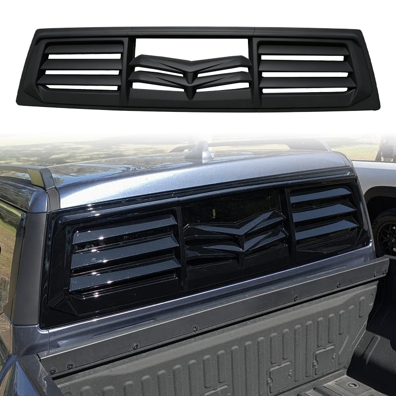 Black slotted rear window louvers installed on a silver pickup truck bed