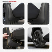 Black heavy-duty vehicle fender flares and wheel arch protection guards.