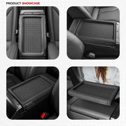 Black textured rubber center console tray and organizer for 4x4 vehicle interior protection.
