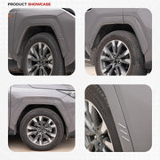 Close-up view of grey SUV wheel, tire, and protective fender flare detail.
