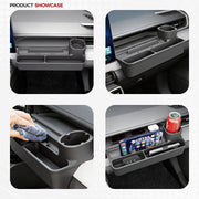 Black interior car dashboard organizer tray with cup holder and storage compartments.