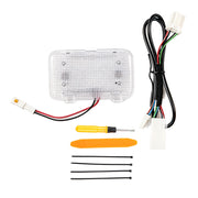Clear LED side marker light kit with wiring harness, screwdriver, and mounting accessories.